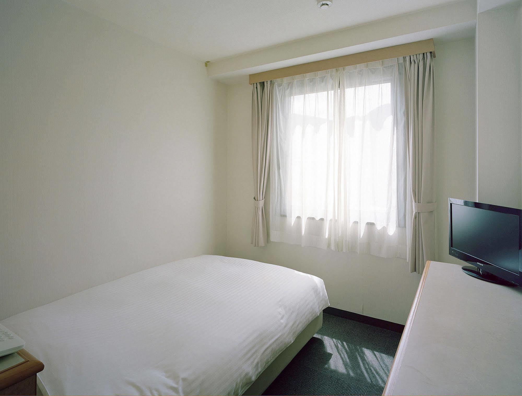 Hotel New Amami Exterior photo